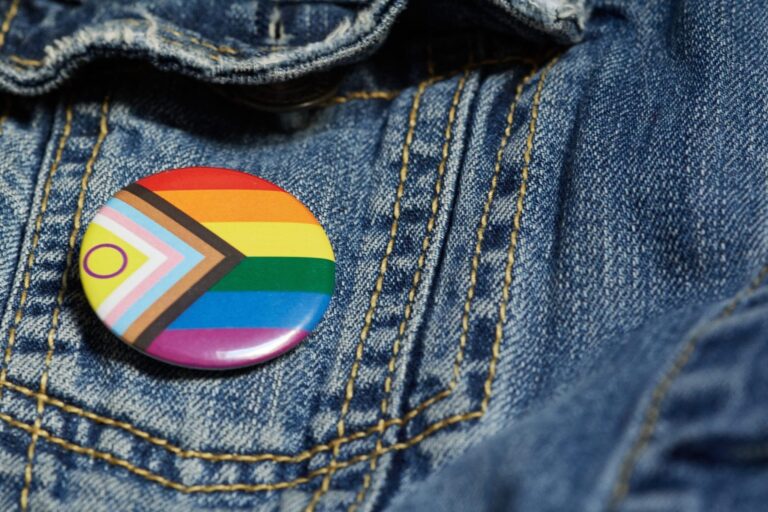 Gender identity symbol on denim fabric
